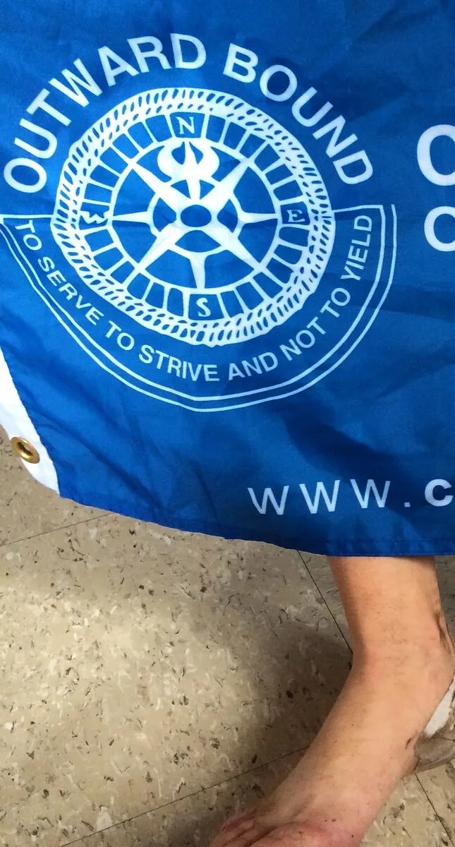 Outward Bound flag representing custom course partnerships