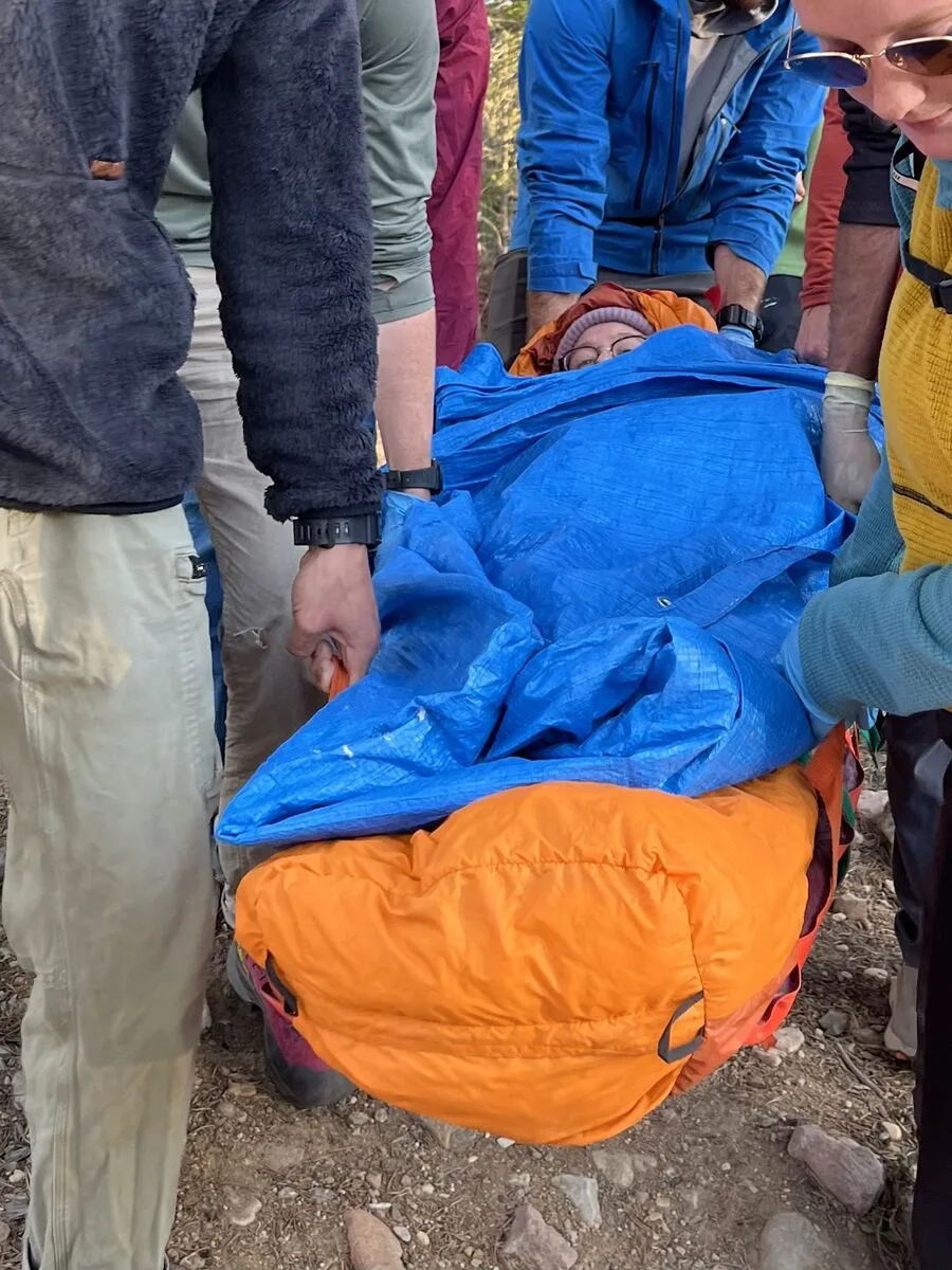 Wilderness First Responder students practicing a litter carry evacuation